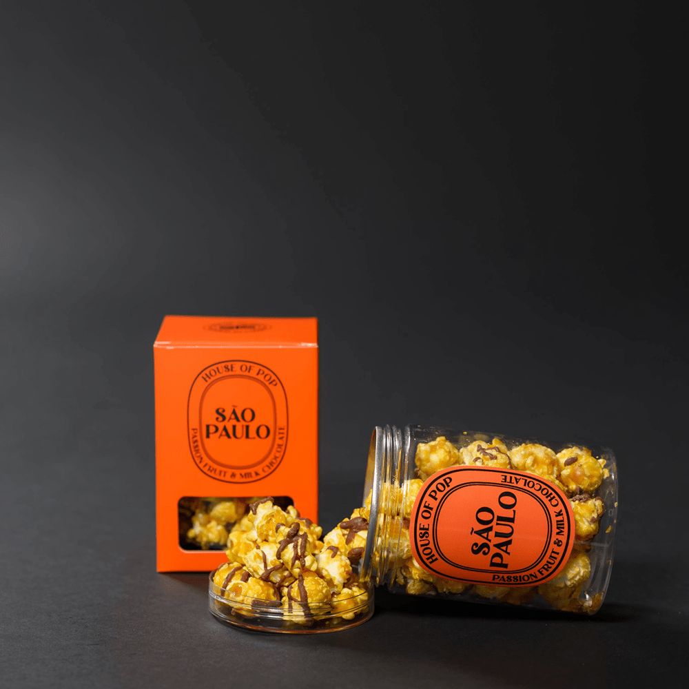 HOUSE OF POP Sao Paulo Passion Fruit & Belgian Milk Chocolate Artisan Popcorn open jar